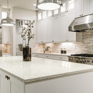 Kitchen with white stone countertops, bright purple wood cabinets