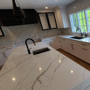 Calacata Quartz Mitered and waterfall edge Location: New Canaan CT Project: Full Kitchen Renovation